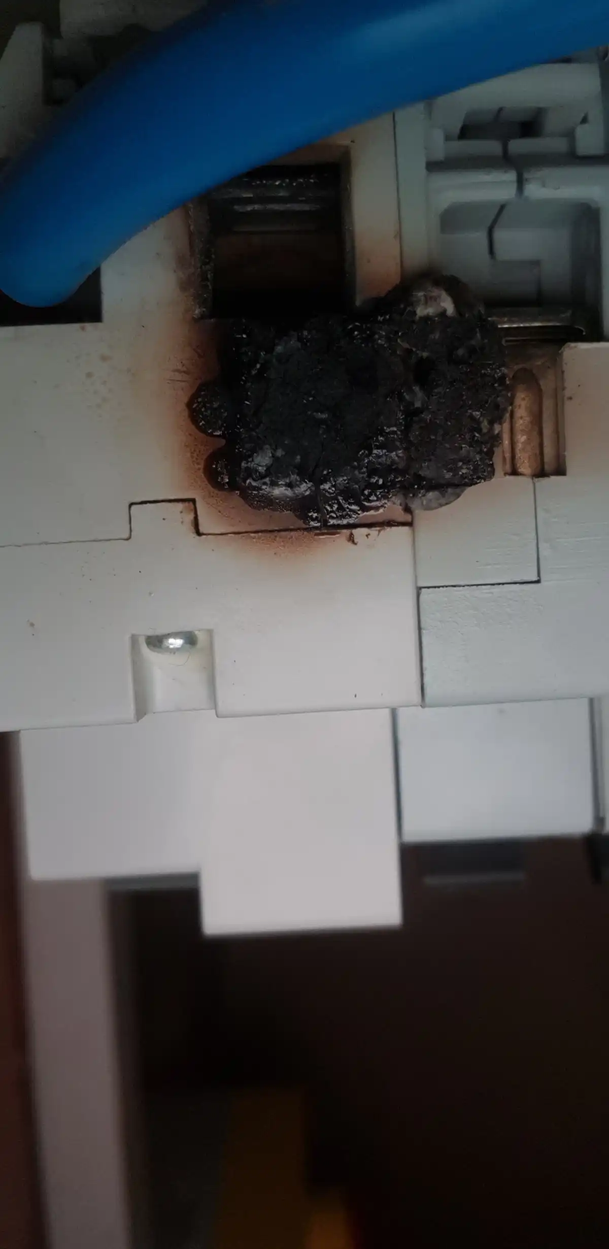 Overheated main switch found during EICR inspection in Honiton